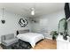 Stylish bedroom with sleek bed, modern decor, and plenty of natural light at 1448 Lambert St, Deltona, FL 32725