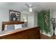 Comfortable bedroom featuring warm wood floors and neutral decor at 1448 Lambert St, Deltona, FL 32725