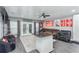 Bright living area with modern decor, stylish island, and plenty of natural light at 1448 Lambert St, Deltona, FL 32725