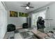Office space with desk, chair, secure safe, and natural light at 1448 Lambert St, Deltona, FL 32725