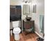 Modern bathroom with a vessel sink, stylish vanity, and efficient toilet at 1475 Lake Shadow Cir # 6205, Maitland, FL 32751