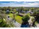 Aerial view with property boundary, capturing a well-maintained home in a leafy, established neighborhood at 1624 Bel Air Ave, Orlando, FL 32812