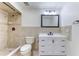 Bathroom features tiled walk-in shower, white vanity, drawers and cabinets for ample storage at 1624 Bel Air Ave, Orlando, FL 32812
