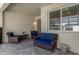 Covered patio featuring comfortable outdoor seating with view to pool at 1644 Tropical Palms Cir, Kissimmee, FL 34747