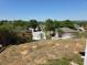 Backyard view of the neighborhood showcases the location and surrounding community at 2018 Knollcrest Dr, Clermont, FL 34711