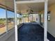 The screened lanai, equipped with ceiling fans, offers a bug-free outdoor retreat at 2018 Knollcrest Dr, Clermont, FL 34711