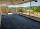Spacious screened-in patio with ceiling fans at 2018 Knollcrest Dr, Clermont, FL 34711