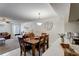 Dining area view shows direct access to the kitchen and the living room at 2028 Royal Bay Blvd # 85, Kissimmee, FL 34746