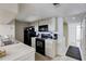Functional kitchen featuring bright cabinets, appliances, and tile flooring at 2028 Royal Bay Blvd # 85, Kissimmee, FL 34746