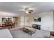 Bright living room open to dining area, with views into the kitchen at 2028 Royal Bay Blvd # 85, Kissimmee, FL 34746