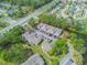 Overhead shot of neighborhood with condo outlined in red, parking area and lake at 2047 Royal Bay Blvd # 21, Kissimmee, FL 34746