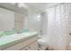 Bathroom featuring a shower-tub combo and sink with ample counter space at 2047 Royal Bay Blvd # 21, Kissimmee, FL 34746