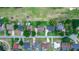 Aerial view of a residential neighborhood with manicured lawns and mature trees near a golf course at 2621 Ardon Ave, Orlando, FL 32833