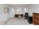 Bright home office with a large window and neutral carpet at 2621 Ardon Ave, Orlando, FL 32833