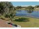 Aerial view of the home showing the roof and expansive water views behind the property at 3 Poinsettia Dr, Debary, FL 32713