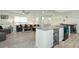Open concept living space featuring a breakfast bar, dining area, and comfortable seating at 3 Poinsettia Dr, Debary, FL 32713