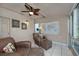 Cozy sunroom featuring comfortable seating, natural light, and a relaxing atmosphere at 3 Poinsettia Dr, Debary, FL 32713