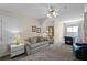 Spacious bonus room featuring neutral walls, plush carpet, ceiling fan, and pool table for added recreation at 3033 Zaharias Dr, Orlando, FL 32837