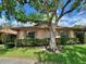 Beautiful one-story home with a large shade tree, offering curb appeal and character at 318 Douglas Way # 87, Winter Garden, FL 34787