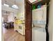Open kitchen with a laundry area that includes a stacked washer and dryer at 318 Douglas Way # 87, Winter Garden, FL 34787