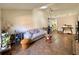 Open-concept living room with tiled floors and ample space for entertaining guests at 318 Douglas Way # 87, Winter Garden, FL 34787