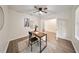 Home office featuring modern desk and ceiling fan with ample lighting and calm atmosphere at 3666 Maidencain St, Clermont, FL 34714