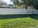 Lush backyard featuring a well-maintained lawn and a privacy fence for secluded outdoor enjoyment at 3764 Rachel St, Apopka, FL 32703