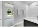 Bright, modern bathroom featuring a spacious walk-in shower, and a sleek vanity with undermount sink at 3764 Rachel St, Apopka, FL 32703