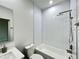 Modern bathroom featuring a subway tile shower over tub combo, offering a clean and contemporary design at 3764 Rachel St, Apopka, FL 32703