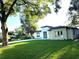 Stunning curb appeal with lush lawn and modern architectural details at 3764 Rachel St, Apopka, FL 32703