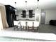 Chic kitchen with island seating, stainless steel appliances, and elegant pendant lighting at 3764 Rachel St, Apopka, FL 32703