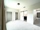 Sun-lit main bedroom featuring neutral tones and ample closet space with a ensuite bathroom at 3764 Rachel St, Apopka, FL 32703