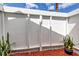 Private backyard with vibrant red mulch and a well-maintained fence for added privacy at 381 Red Mulberry Ct, Longwood, FL 32779