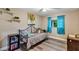 Relaxing bedroom with a window, soft colors, and plenty of space at 381 Red Mulberry Ct, Longwood, FL 32779