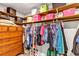 Spacious closet with custom shelving and drawers to provide optimal organization for your wardrobe and accessories at 381 Red Mulberry Ct, Longwood, FL 32779