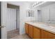 Bright bathroom with double sinks, generous counter space, and private toilet area at 4951 Alita Ter, St Cloud, FL 34769