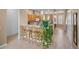 Bright eat-in kitchen features a breakfast bar, light wood cabinetry, and ample counter space at 4951 Alita Ter, St Cloud, FL 34769