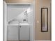 Laundry room with a full-size washer and dryer inside of a closet with open doors at 4951 Alita Ter, St Cloud, FL 34769