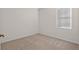 Bedroom featuring carpet floors, a window for natural light, and neutral paint at 5044 Wise Bird Dr, Windermere, FL 34786