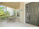 Charming front porch with seating, offering a relaxed entry to the home and neighborhood views at 5044 Wise Bird Dr, Windermere, FL 34786