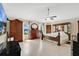 Expansive main bedroom with wood-look floors, ceiling fan, and furniture set at 5051 Silver Thistle Ln, St Cloud, FL 34772