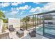 Outdoor patio with a screened in pool provides ample space for relaxation and entertaining by the pool at 5051 Silver Thistle Ln, St Cloud, FL 34772