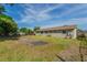 Large backyard with a small storage building at 5379 Botany Ct, Orlando, FL 32811