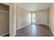 View of the front entry to the home, features closet and window at 5379 Botany Ct, Orlando, FL 32811
