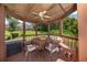 Cozy gazebo with seating area, perfect for outdoor dining and relaxation with scenic views at 5479 Baytowne Pl, Oviedo, FL 32765