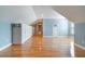 Bedroom featuring hardwood floors, angled ceiling, large built-in storage, and bright window at 6125 Foxfield Ct, Windermere, FL 34786