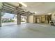 Spacious three-car garage offering ample storage, with easy access to the main house and additional side entry at 6125 Foxfield Ct, Windermere, FL 34786