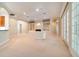 Open-concept layout with fireplace, built-ins, and French doors, perfect for entertaining and relaxing at 6125 Foxfield Ct, Windermere, FL 34786
