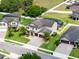 Beautiful home with a well manicured lawn in a Gathering friendly community at 676 Bishop Bay Loop, Apopka, FL 32712