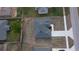 Aerial view of a home, showcasing its roof and surrounding lot at 699 Marion Oaks Trl, Ocala, FL 34473